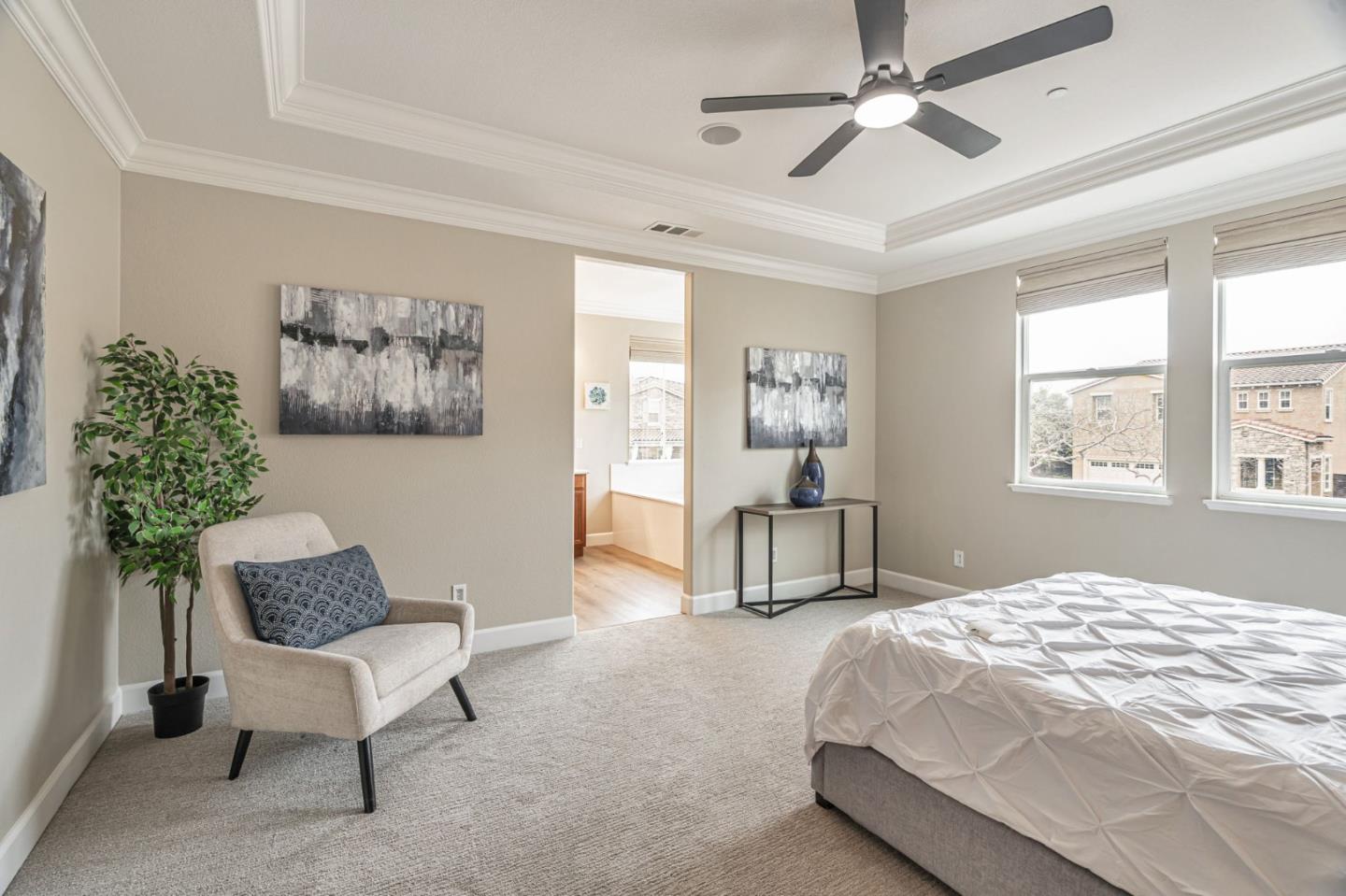 6525 Gravina Loop San Jose, CA 95138 - Photo 5 of 63 a bedroom with a bed and a chair