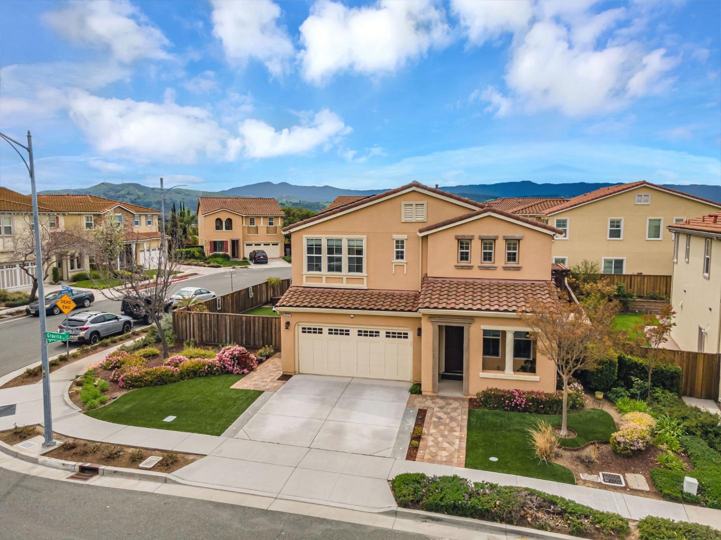 6525 Gravina Loop San Jose, CA 95138 - Photo 54 of 63 a view of a white house with a yard in front of it