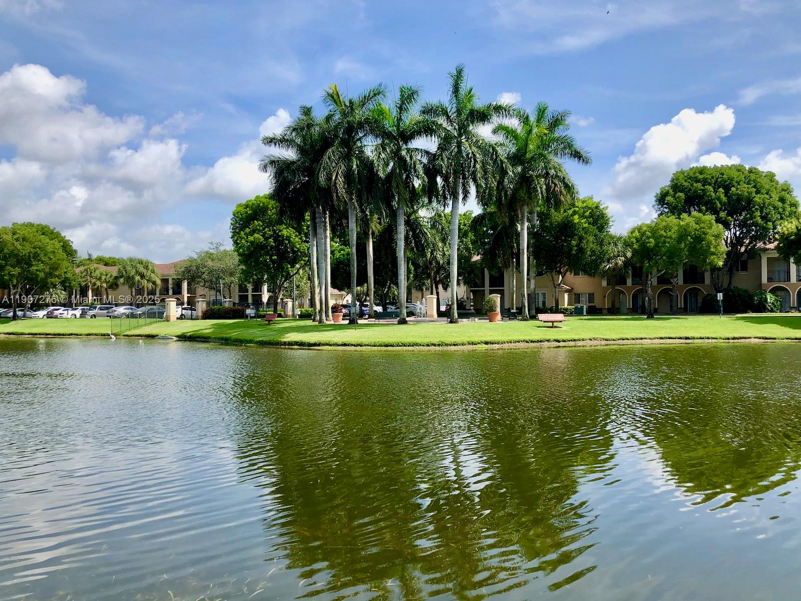 2532 Centergate Drive, Unit 102 Miramar, FL 33025 - Photo 34 of 58 a view of a lake with houses