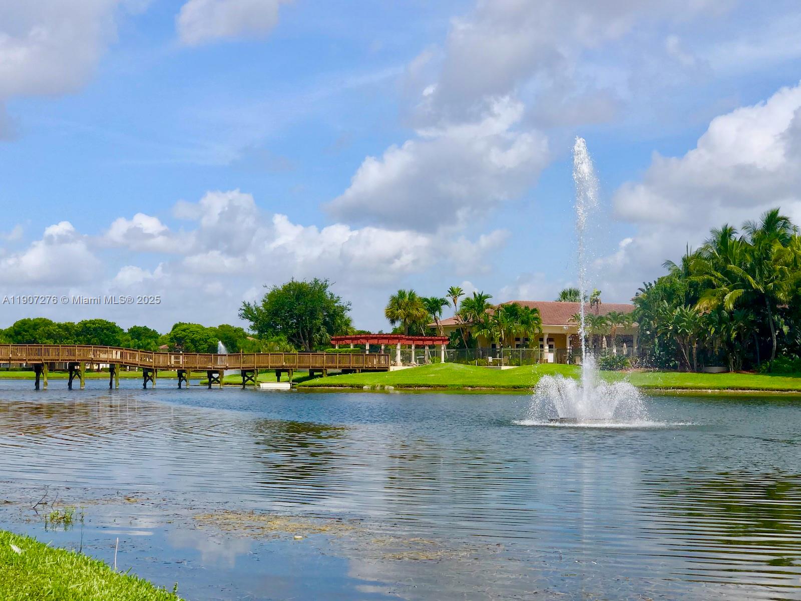 2532 Centergate Drive, Unit 102 Miramar, FL 33025 - Photo 39 of 58 a view of lake with green space