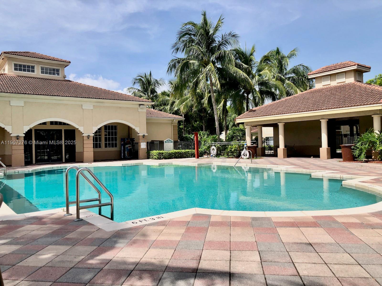 2532 Centergate Drive, Unit 102 Miramar, FL 33025 - Photo 45 of 58 a view of house with outdoor space and swimming pool