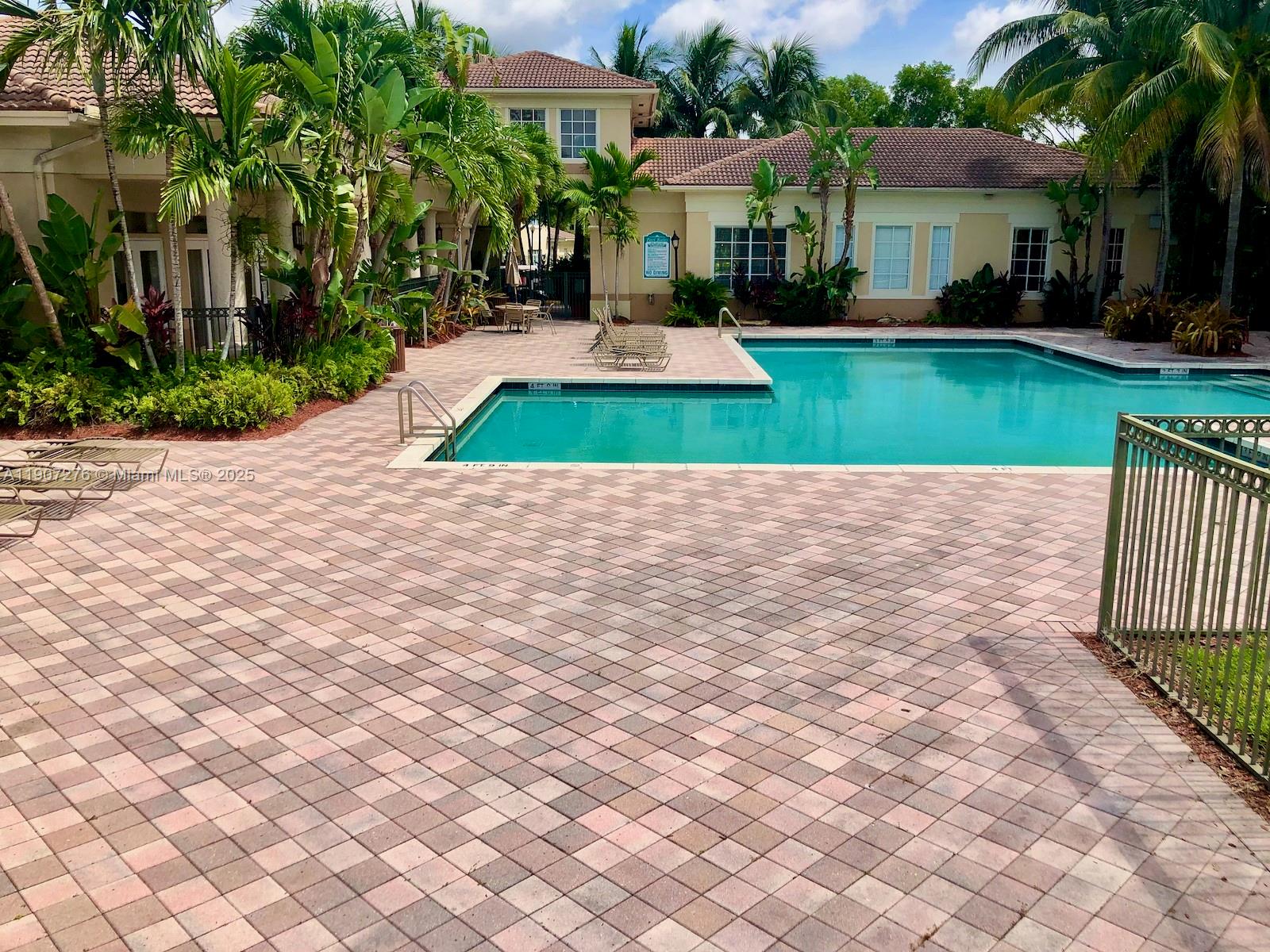 2532 Centergate Drive, Unit 102 Miramar, FL 33025 - Photo 46 of 58 a view of house with backyard and outdoor seating