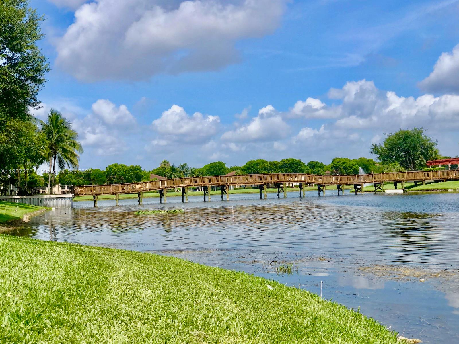 2532 Centergate Drive, Unit 102 Miramar, FL 33025 - Photo 49 of 58 a view of outdoor space with lake view