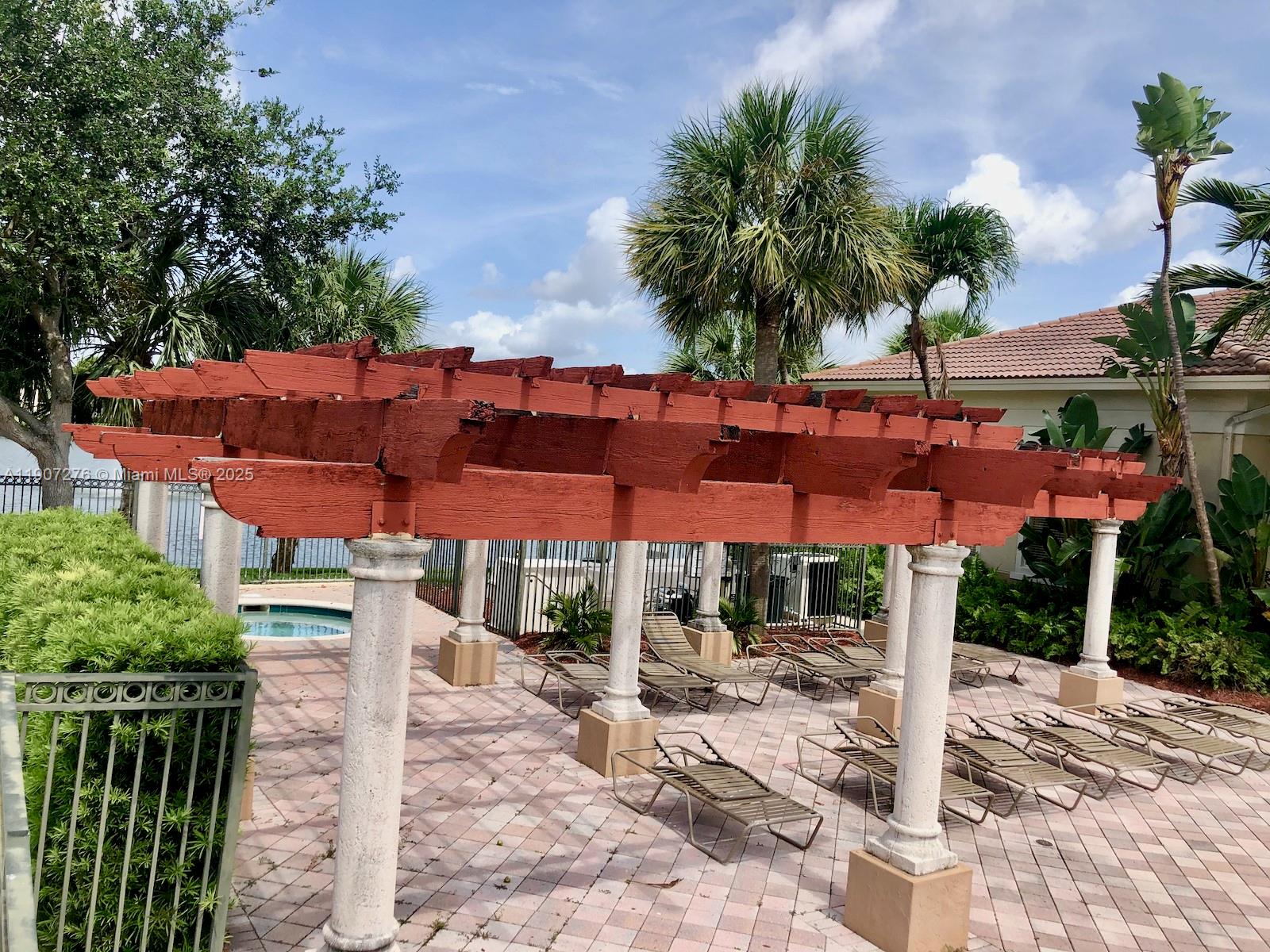 2532 Centergate Drive, Unit 102 Miramar, FL 33025 - Photo 50 of 58 a view of house with yard and entertaining space