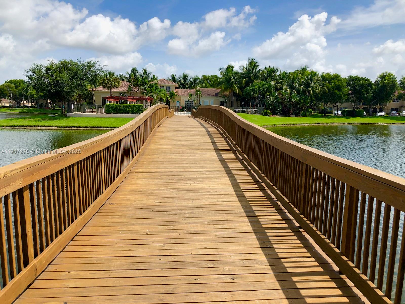 2532 Centergate Drive, Unit 102 Miramar, FL 33025 - Photo 54 of 58 a view of swimming pool with a yard