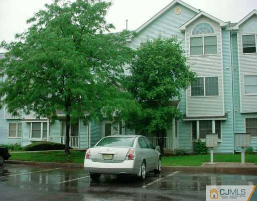 224 Edpas Road New Brunswick, NJ 08901 - Photo 1 of 8 a white house covered with tall trees