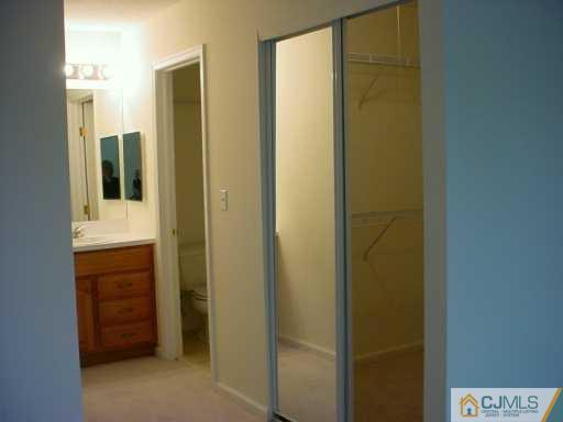 224 Edpas Road New Brunswick, NJ 08901 - Photo 6 of 8 a bathroom with a shower and a sink