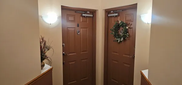 a bathroom with a shower and a mirror
