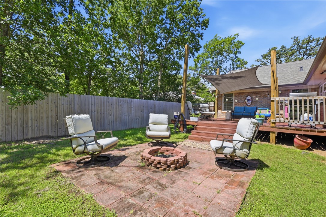 515 Crescent Drive Bryan, TX 77801 - Photo 35 of 43 Just off the large deck, fire pit with pavers