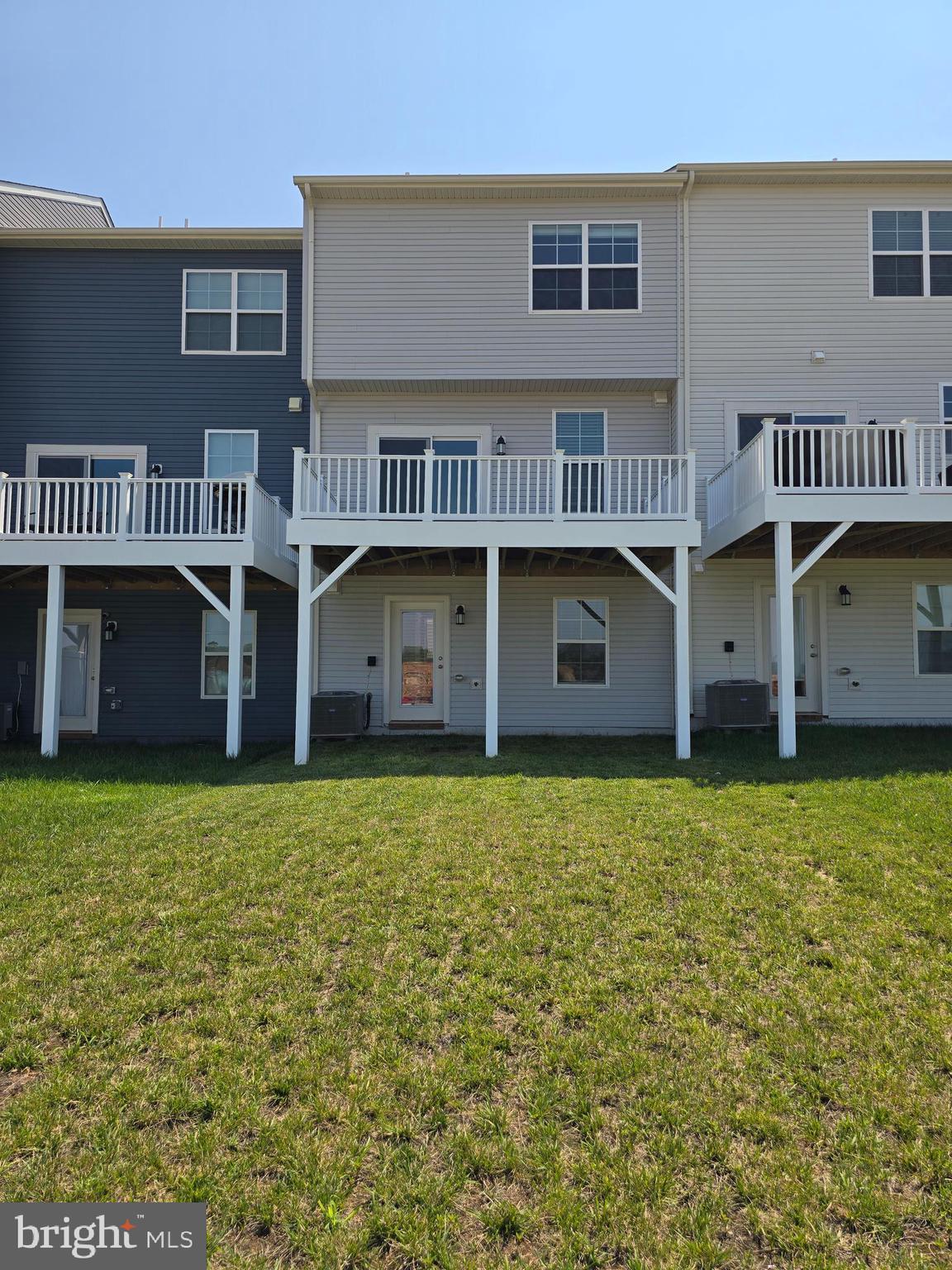 103 Winterplace Drive Charles Town, WV 25414 - Photo 2 of 20 a front view of a building with garden