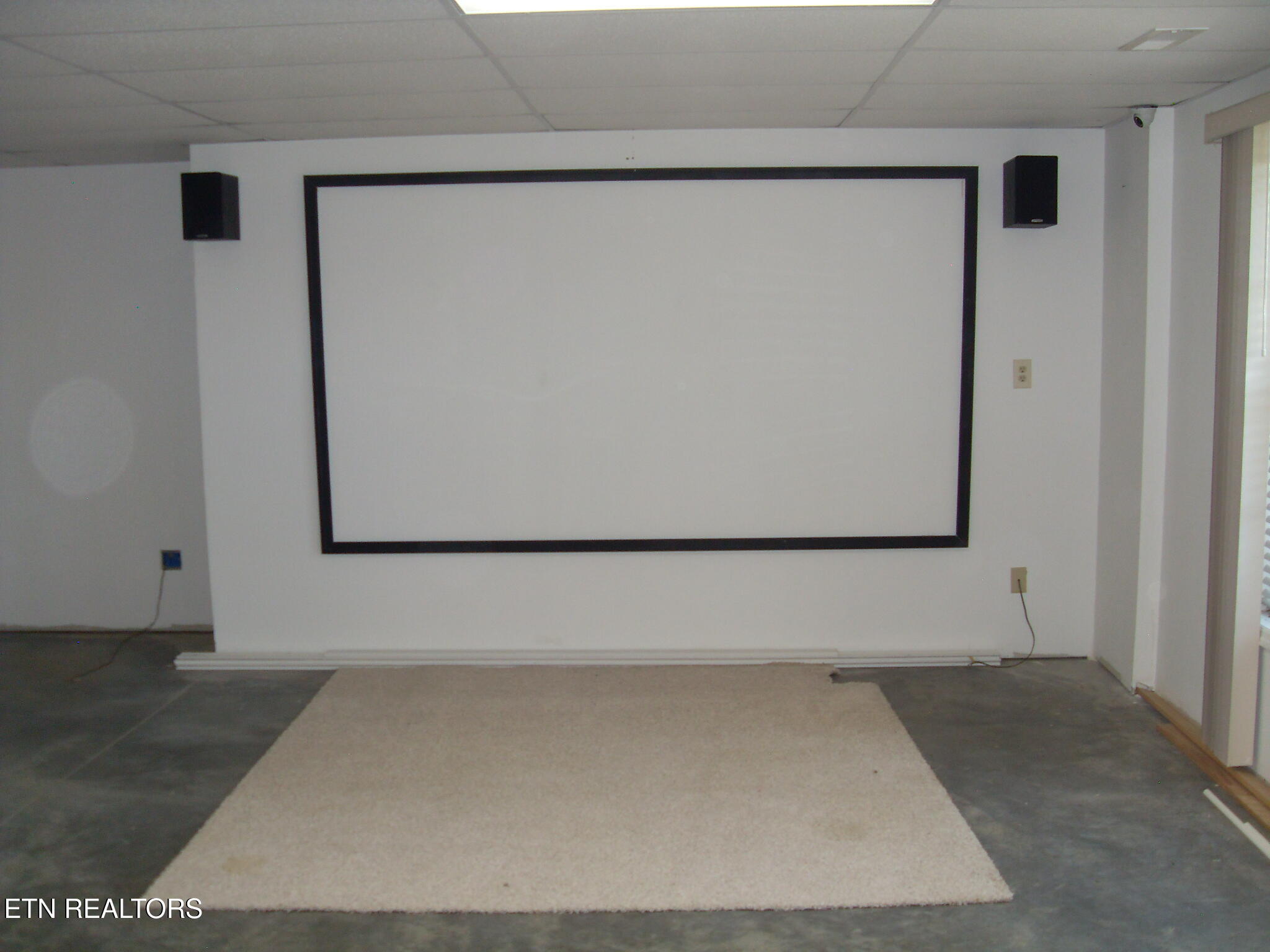 6742 Ridgeview Road Knoxville, TN 37918 - Photo 22 of 27 Downstairs Media Room 133 inch screen