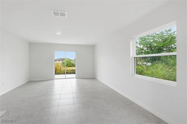 an empty room with windows