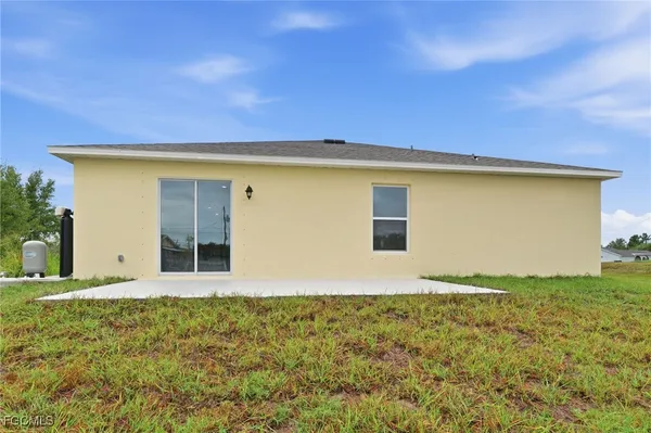 a view of an house with backyard space