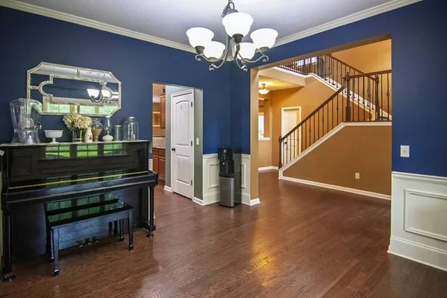 a bathroom with a sink a vanity and a mirror