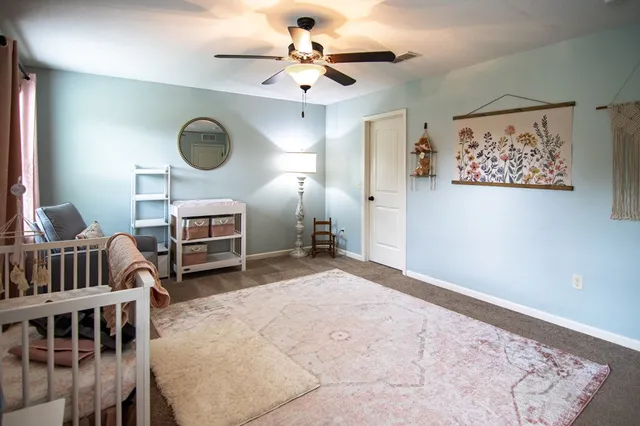 an aerial view of a house with outdoor space pool seating area and yard