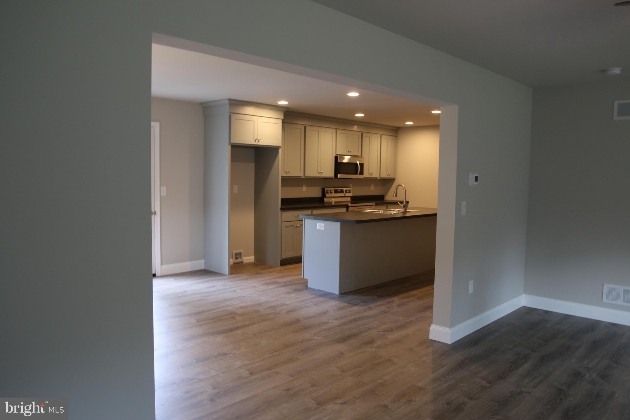 208 Lawn Road Palmyra, PA 17078 - Photo 6 of 22 Living Room Facing Dining/Kitchen area
