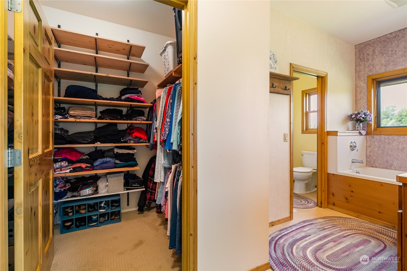 852 Lange Road Bellingham, WA 98226 - Photo 14 of 40 a view of walk in closet with clothes and shoes