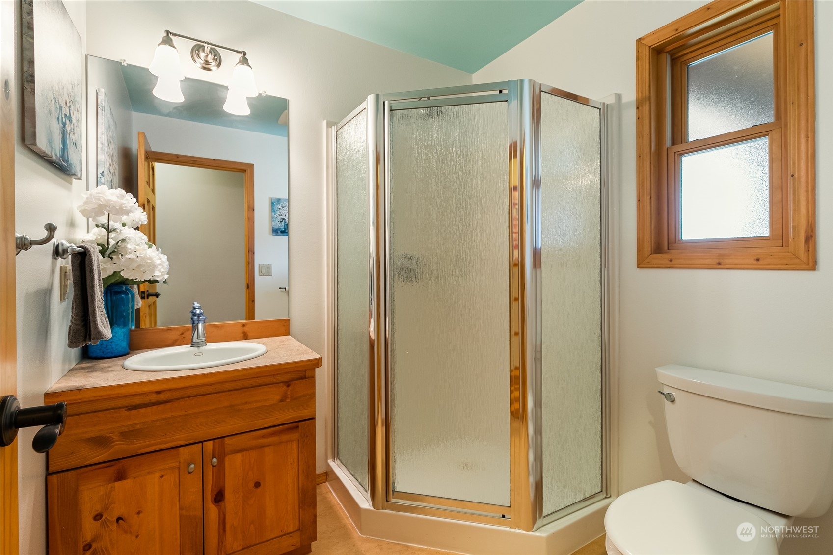 852 Lange Road Bellingham, WA 98226 - Photo 18 of 40 a bathroom with a sink a toilet and shower