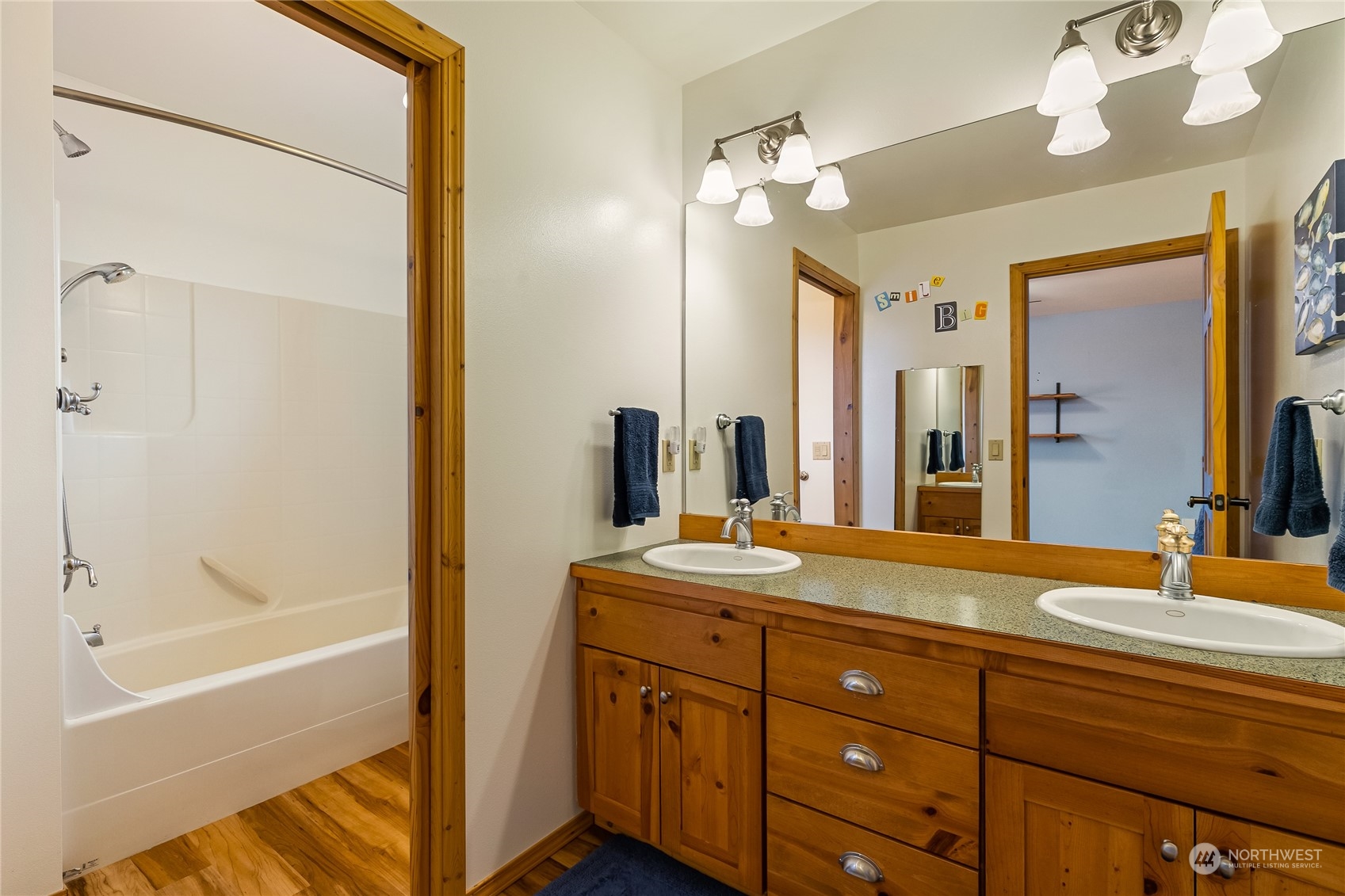 852 Lange Road Bellingham, WA 98226 - Photo 20 of 40 a bathroom with a tub sink and mirror