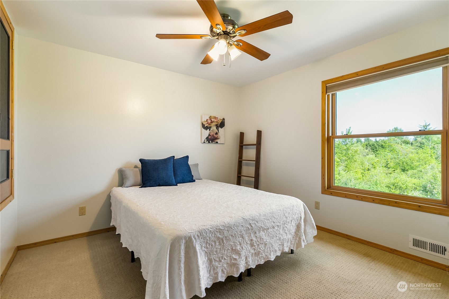 852 Lange Road Bellingham, WA 98226 - Photo 22 of 40 a bedroom with a bed and a window