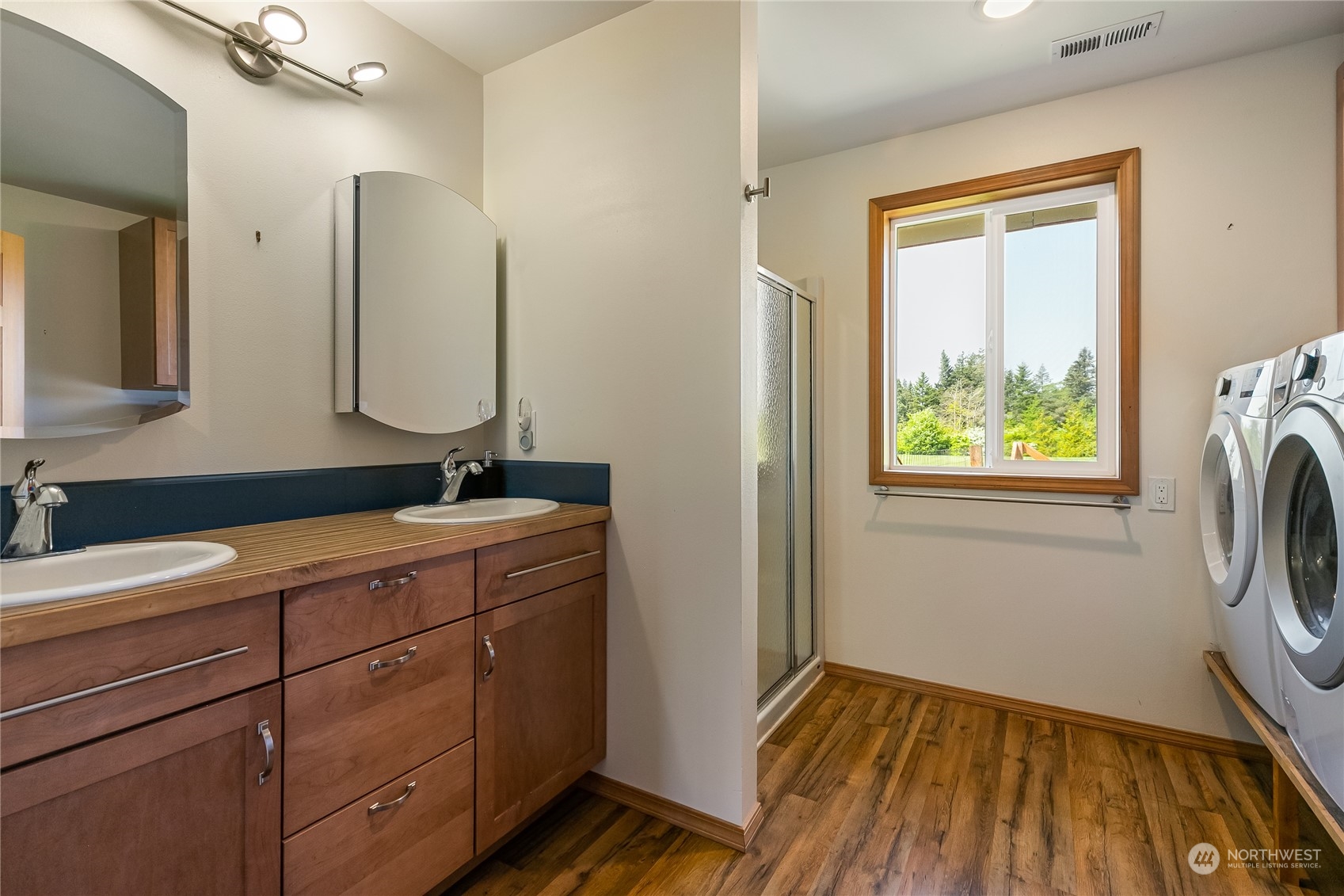 852 Lange Road Bellingham, WA 98226 - Photo 31 of 40 a bathroom with a sink and a mirror