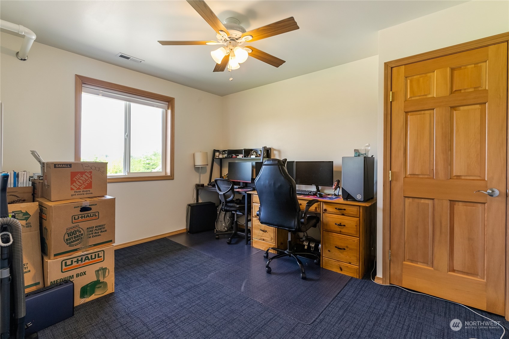 852 Lange Road Bellingham, WA 98226 - Photo 32 of 40 a view of a workspace with furniture and a window