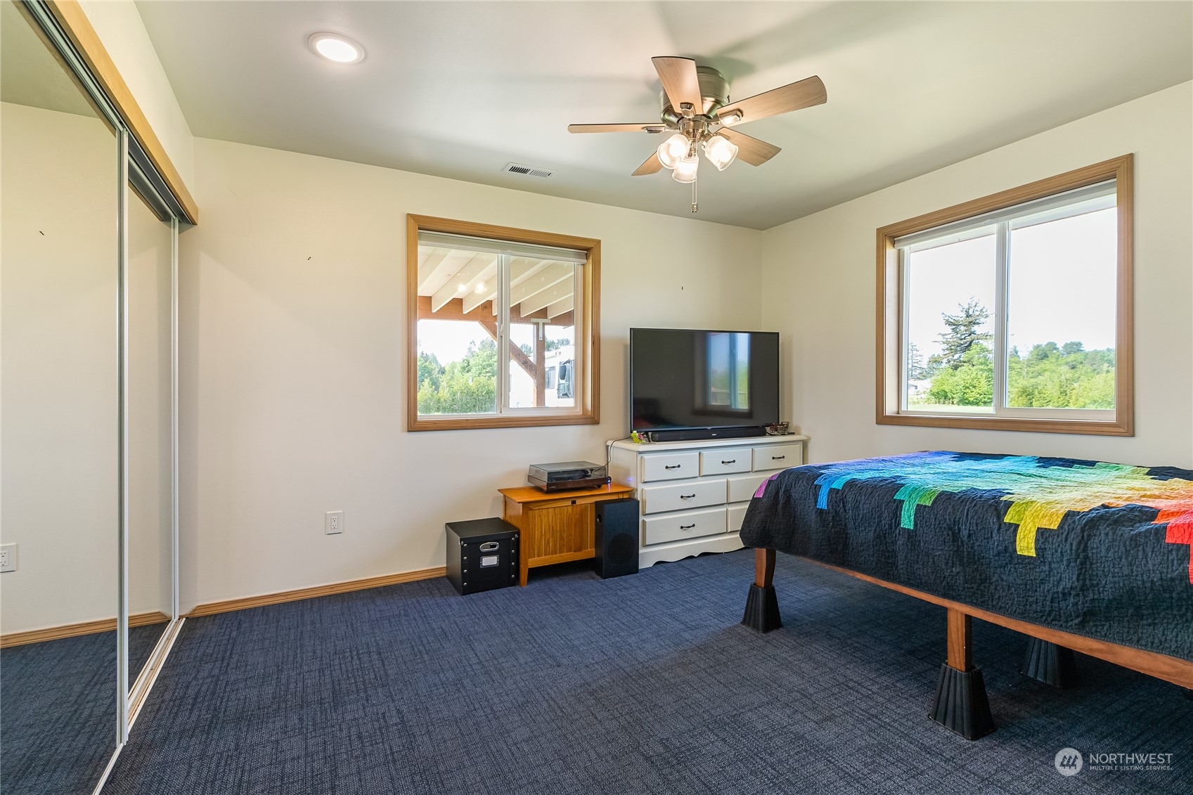 852 Lange Road Bellingham, WA 98226 - Photo 33 of 40 a bedroom with furniture and a flat screen tv