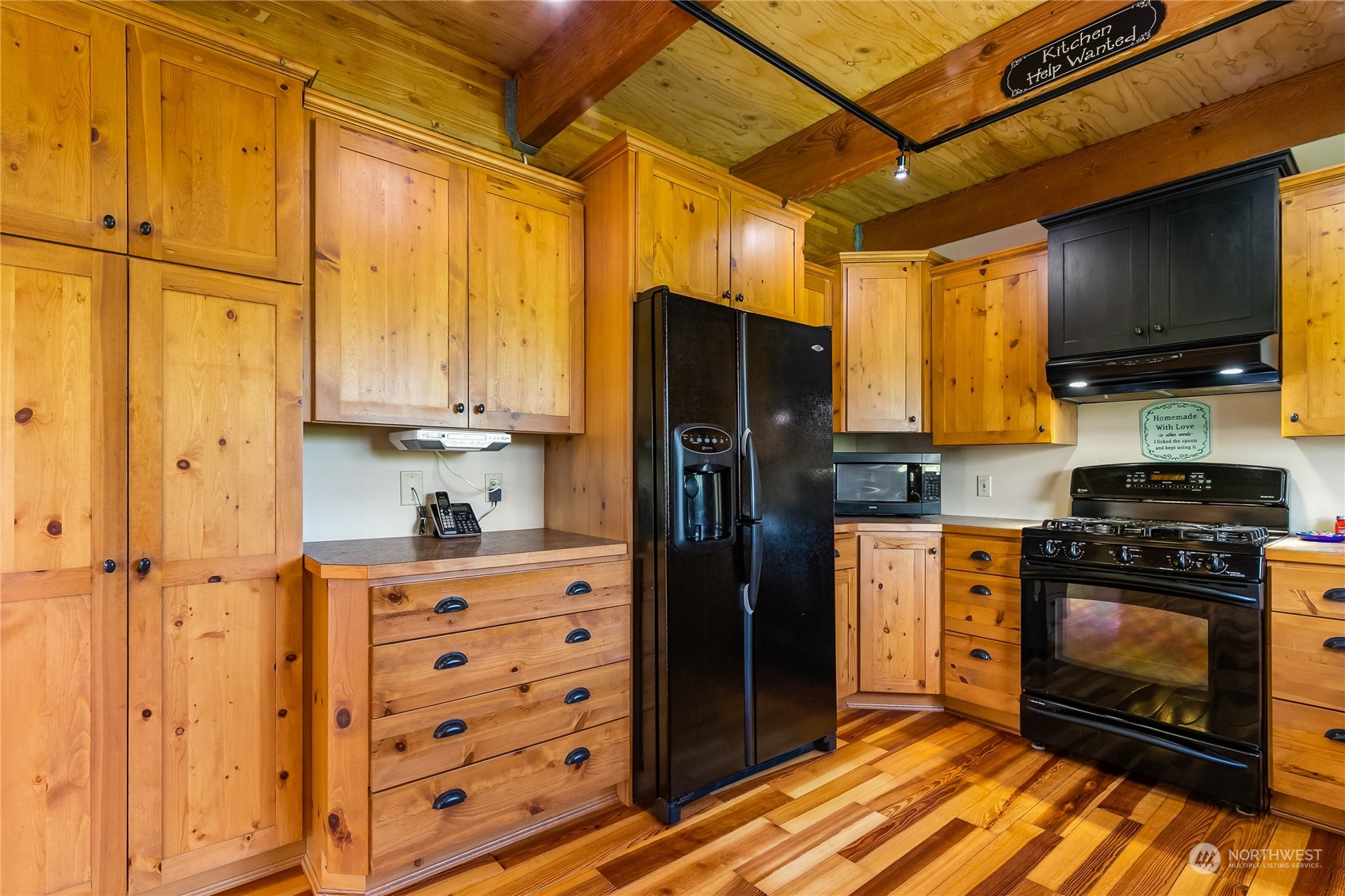 852 Lange Road Bellingham, WA 98226 - Photo 8 of 40 a kitchen with stainless steel appliances a stove a refrigerator and cabinets