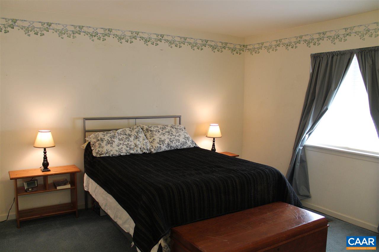 11 Dogleg Road Palmyra, VA 22963 - Photo 21 of 28 a bedroom with a bed and a window