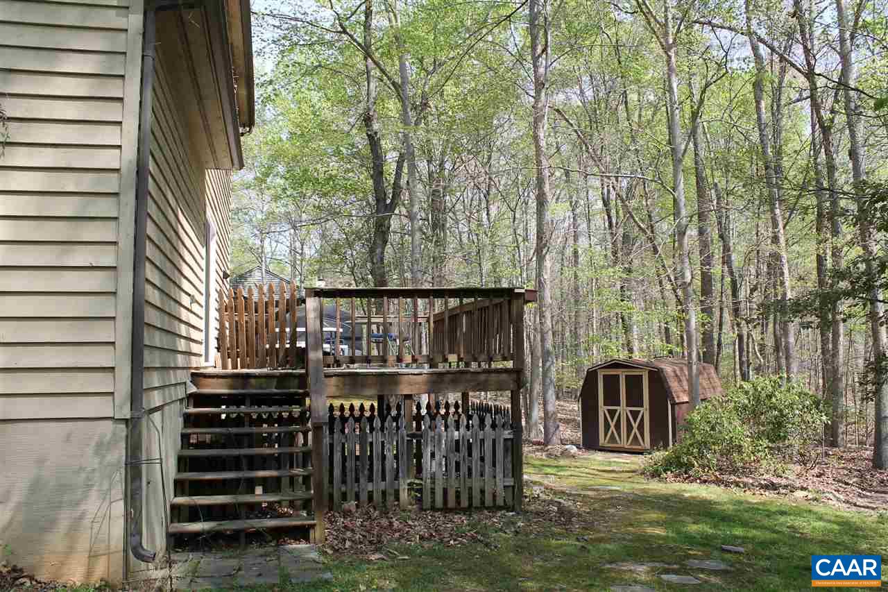 11 Dogleg Road Palmyra, VA 22963 - Photo 25 of 28 a view of a chairs and table in backyard