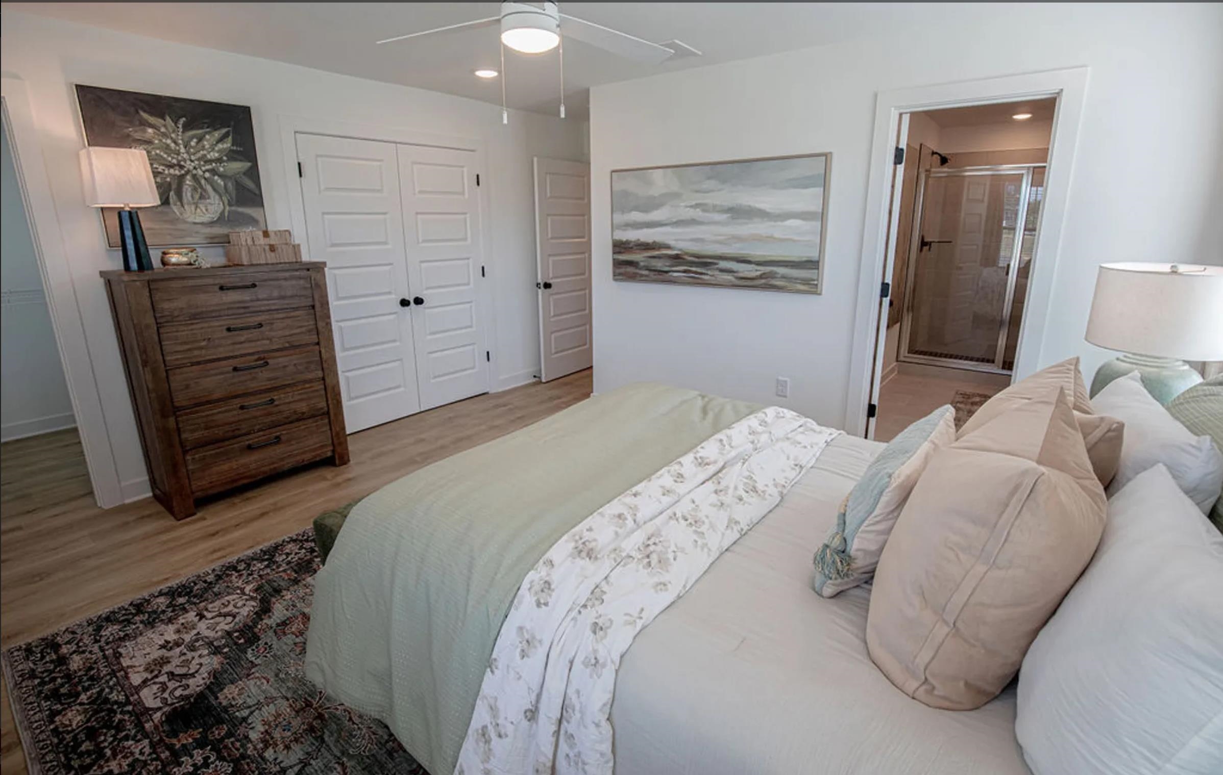 6888 Talcott Lane Bartlett, TN 38135 - Photo 11 of 19 Bedroom featuring wood finished floors, a ceiling fan, a closet, ensuite bath, and recessed lighting
