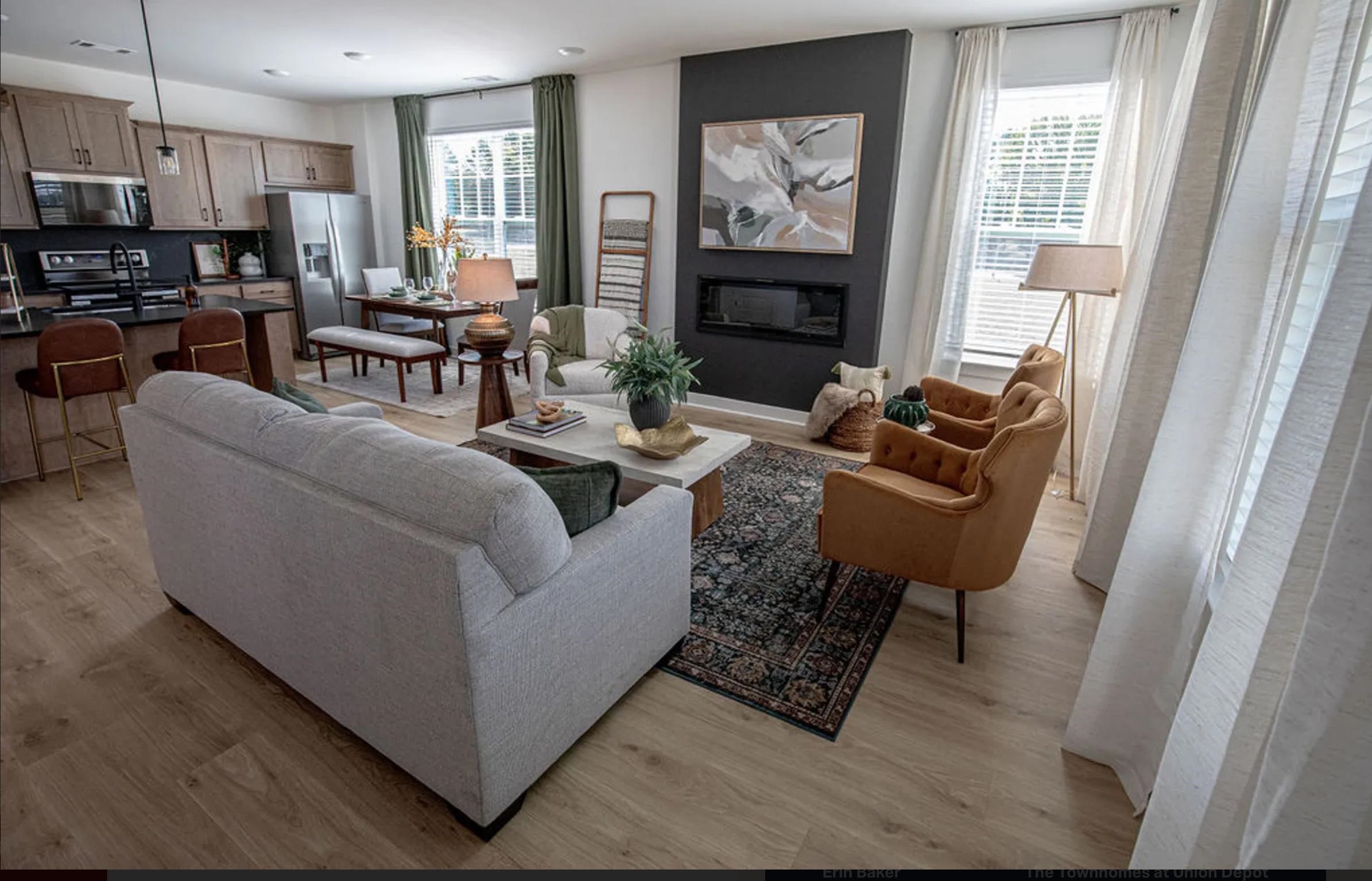 6888 Talcott Lane Bartlett, TN 38135 - Photo 2 of 19 Living area featuring light wood-type flooring and a large fireplace