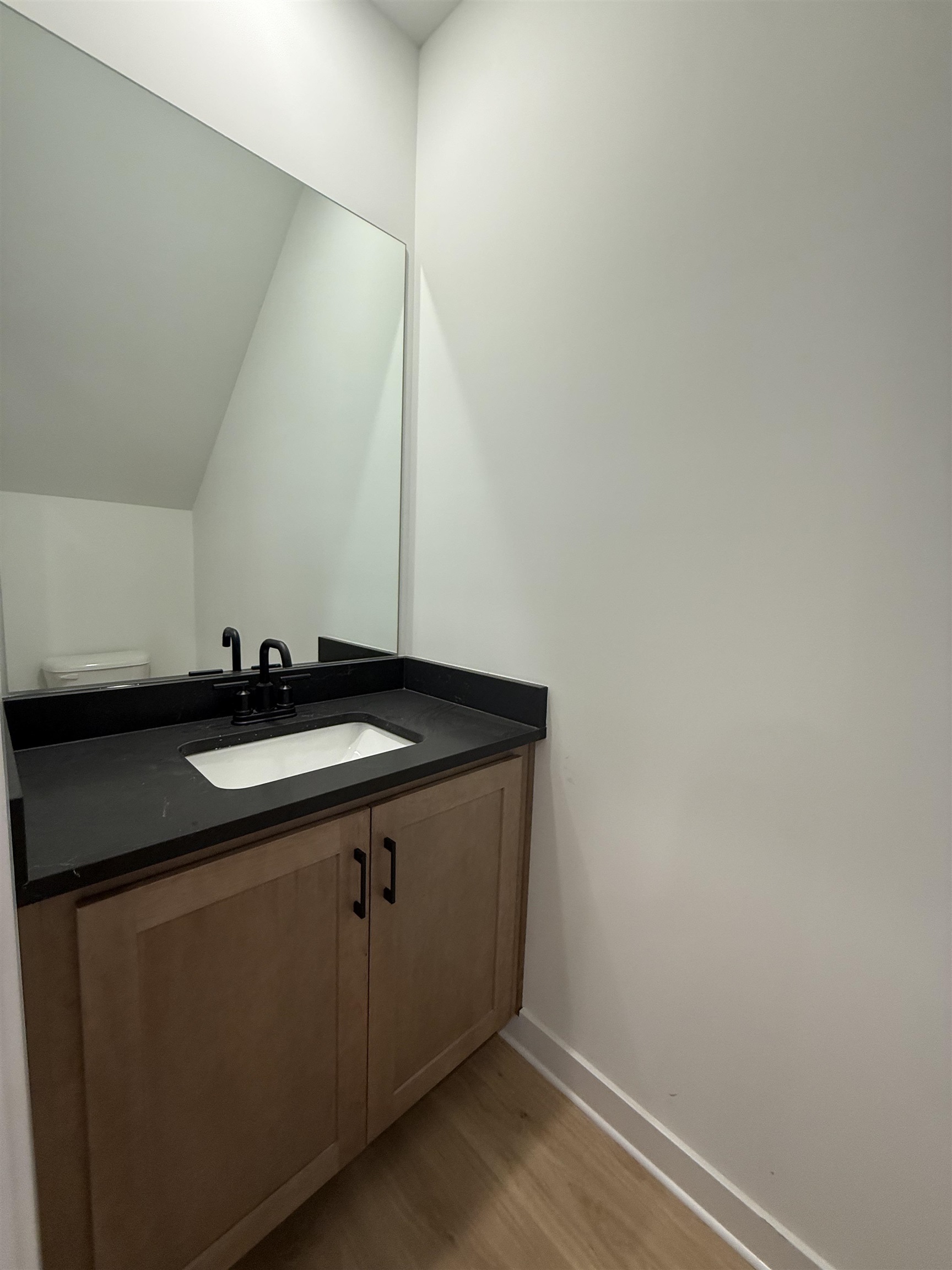 6888 Talcott Lane Bartlett, TN 38135 - Photo 10 of 16 a sink sitting inside of a bathroom