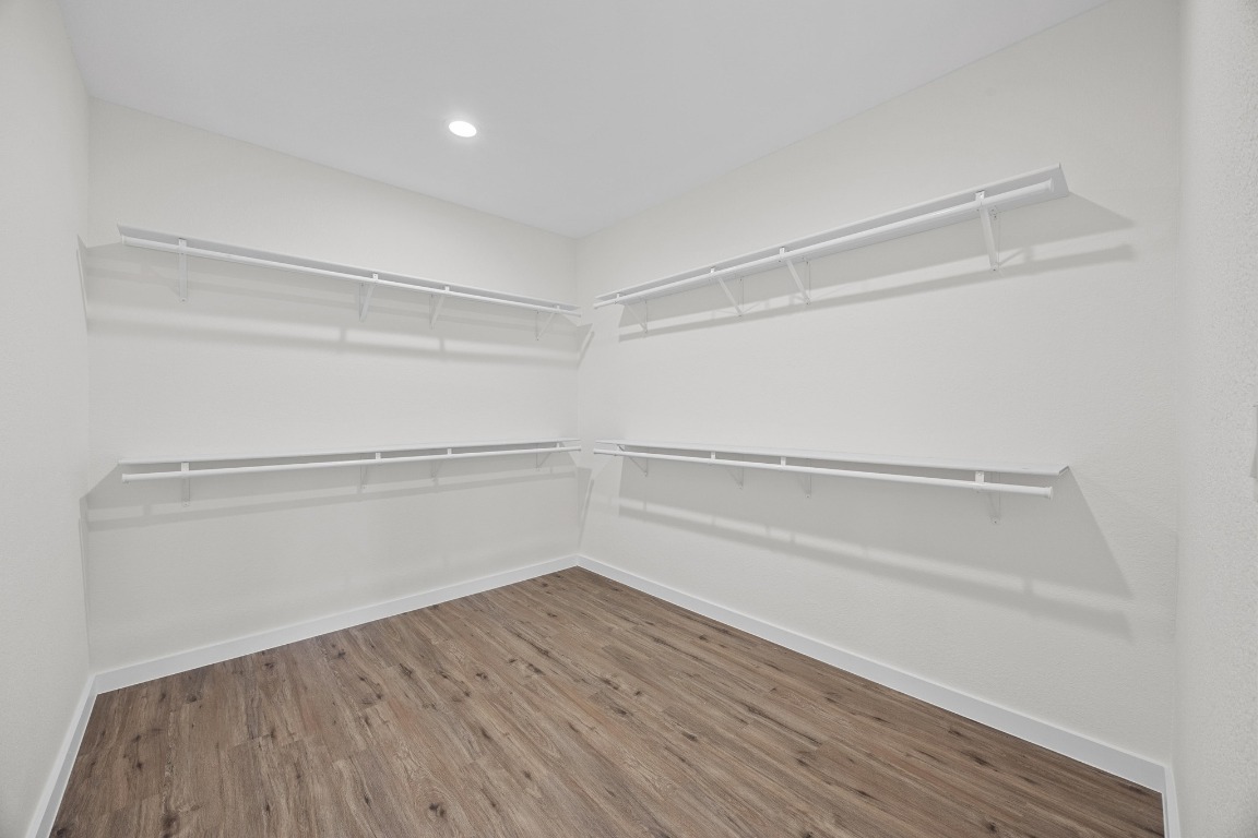 17701 Village Drive Dripping Springs, TX 78620 - Photo 19 of 36 a view of an empty walk in closet