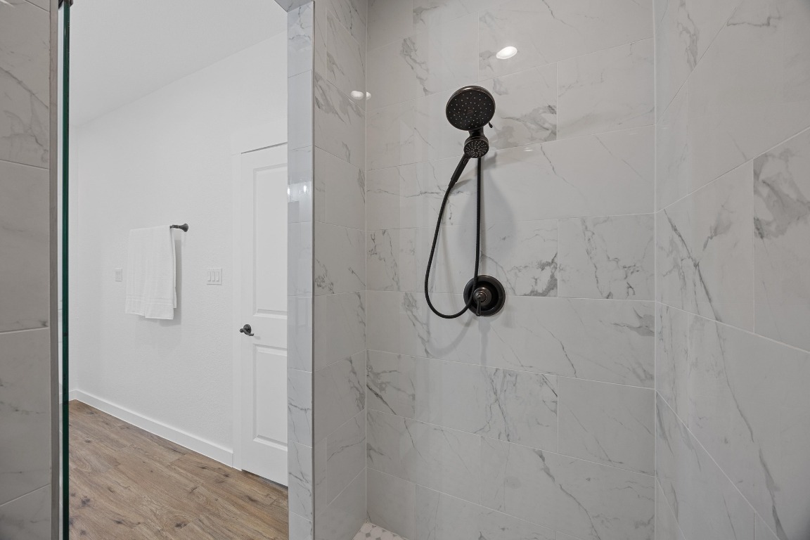 17701 Village Drive Dripping Springs, TX 78620 - Photo 23 of 36 a bathroom with a shower
