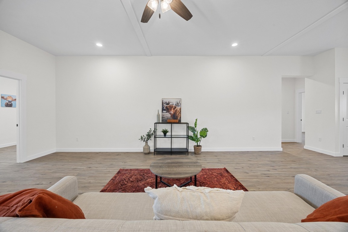 17701 Village Drive Dripping Springs, TX 78620 - Photo 6 of 36 a bedroom with a bed and a couch