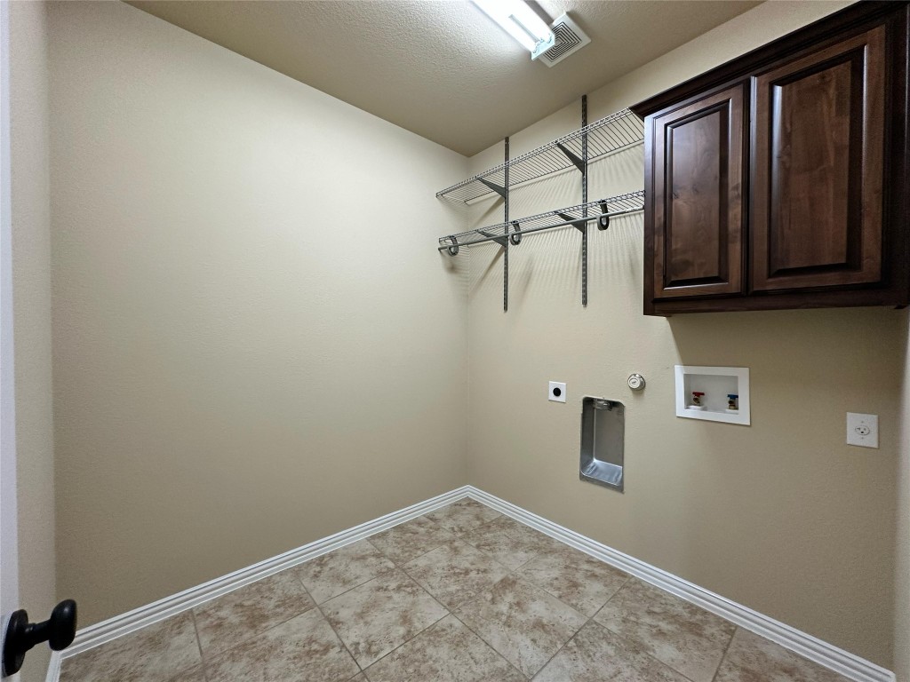 106 Shetland Lane Cedar Park, TX 78613 - Photo 18 of 31 view of a room with rack on the wall