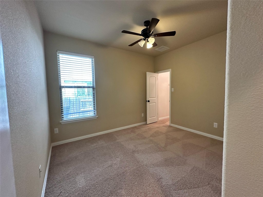 106 Shetland Lane Cedar Park, TX 78613 - Photo 20 of 31 a view of an empty room with a window