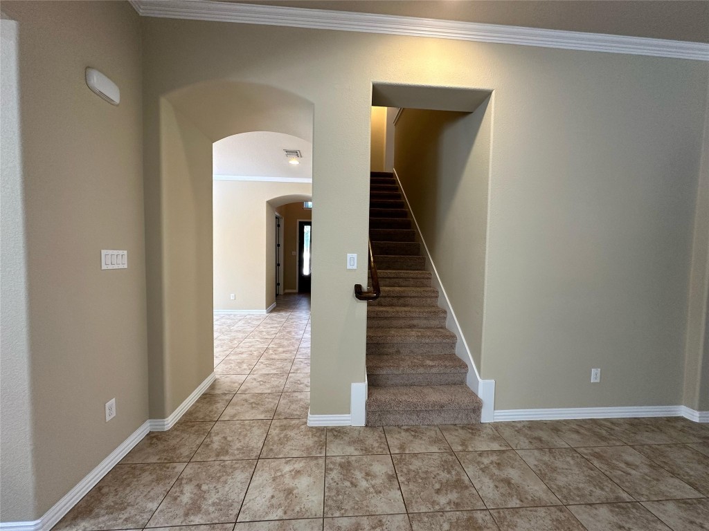 106 Shetland Lane Cedar Park, TX 78613 - Photo 23 of 31 a view of a hallway with wooden floor and staircase
