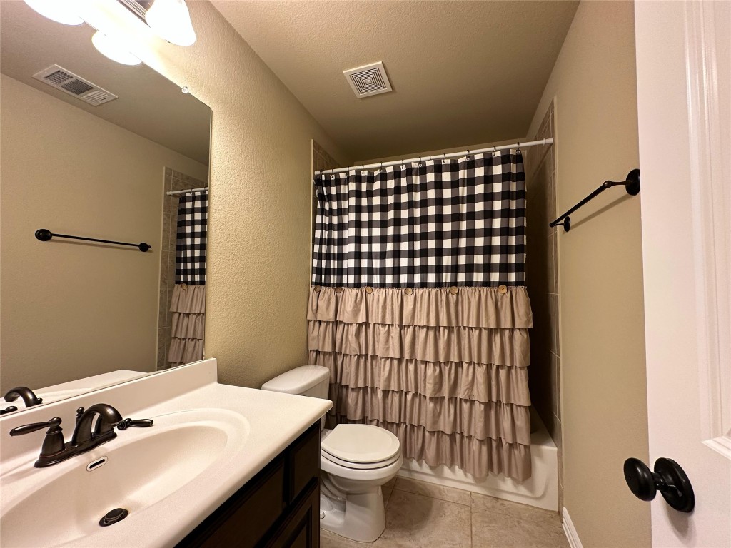 106 Shetland Lane Cedar Park, TX 78613 - Photo 27 of 31 a bathroom with a sink toilet and shower