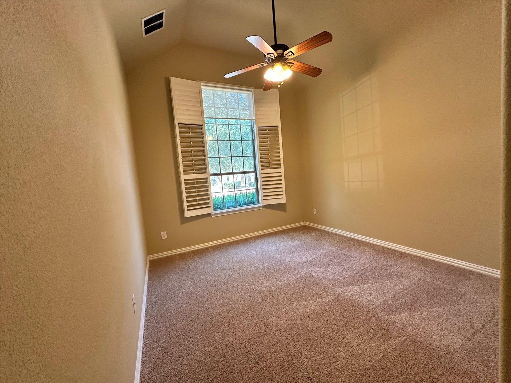 106 Shetland Lane Cedar Park, TX 78613 - Photo 8 of 31 a view of an empty room with a window