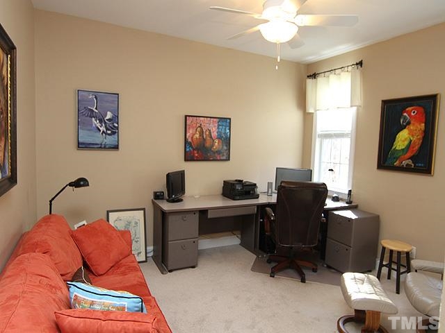 11618 John Allen Road Raleigh, NC 27614 - Photo 16 of 25 a view of a workspace with furniture and a window