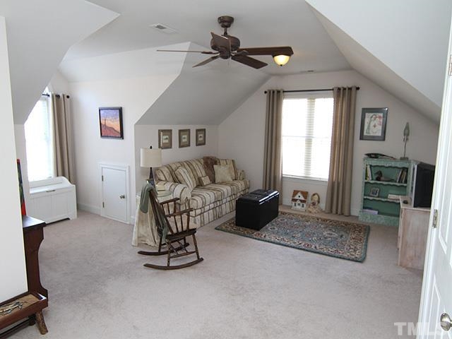 11618 John Allen Road Raleigh, NC 27614 - Photo 18 of 25 a bedroom with furniture and a window