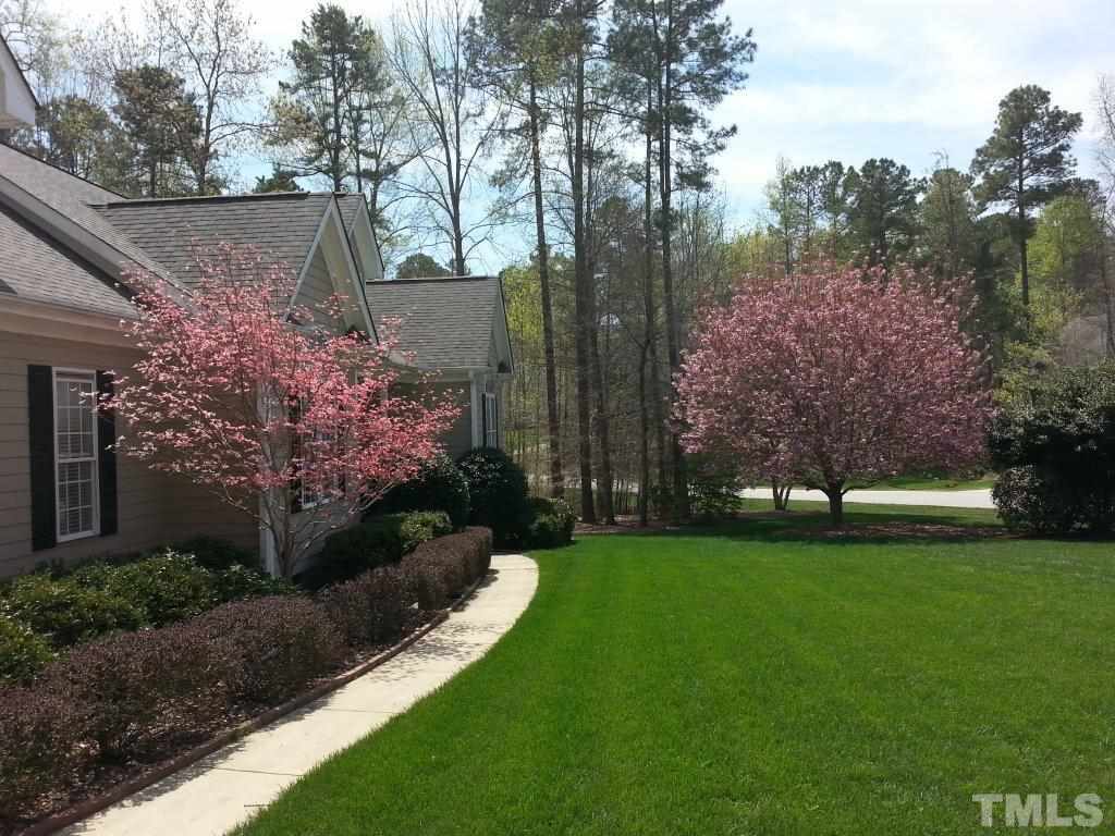 11618 John Allen Road Raleigh, NC 27614 - Photo 3 of 25 a view of a house with a backyard
