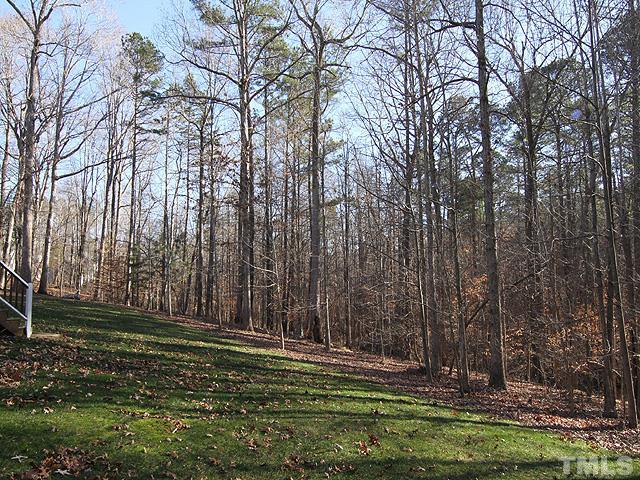 11618 John Allen Road Raleigh, NC 27614 - Photo 23 of 25 a backyard of a house with lots of green space