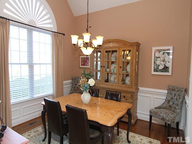 11618 John Allen Road Raleigh, NC 27614 - Photo 6 of 25 a view of a dining room with furniture window and wooden floor