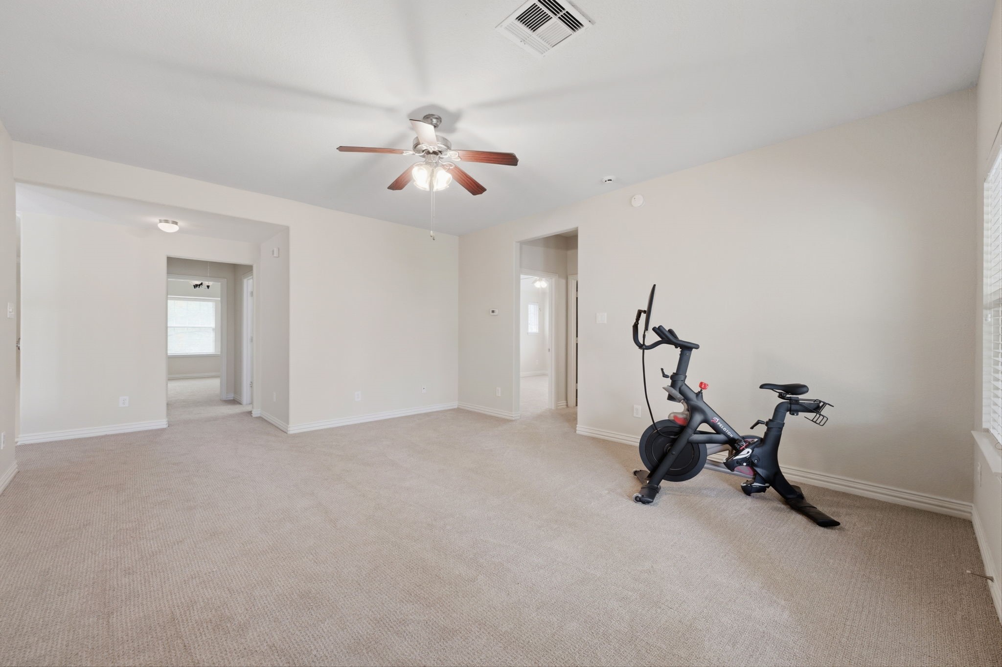 315 Arbor Ridge Lane Conroe, TX 77384 - Photo 27 of 48 a view of a room with gym equipment
