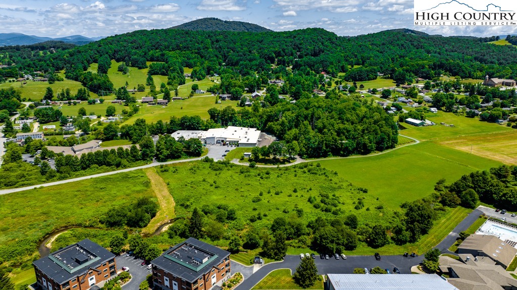 0 Candy Lane Boone, NC 28607 - Photo 11 of 24 a view of a city with lush green forest