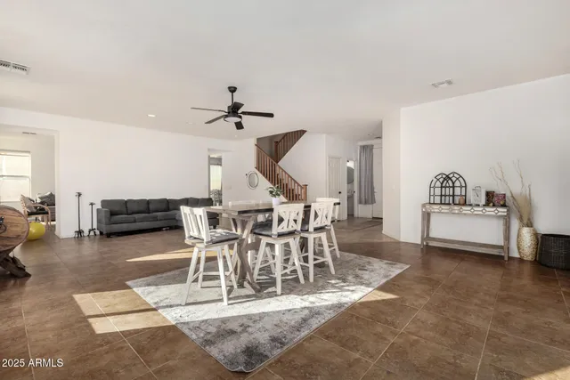 a view of a living room and dining room