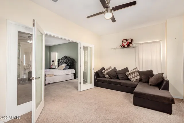 a living room with furniture and a couch